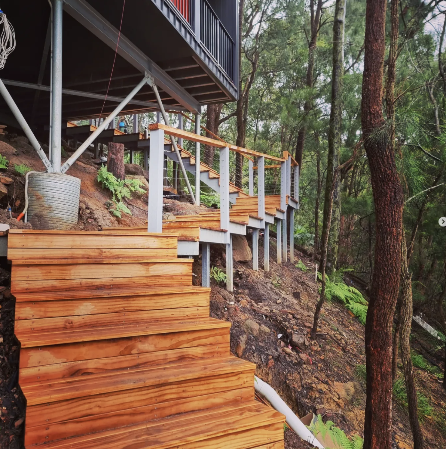 BAL-29 compliant timber staircase and balustrade on a steep bushland block in Umina Beach NSW